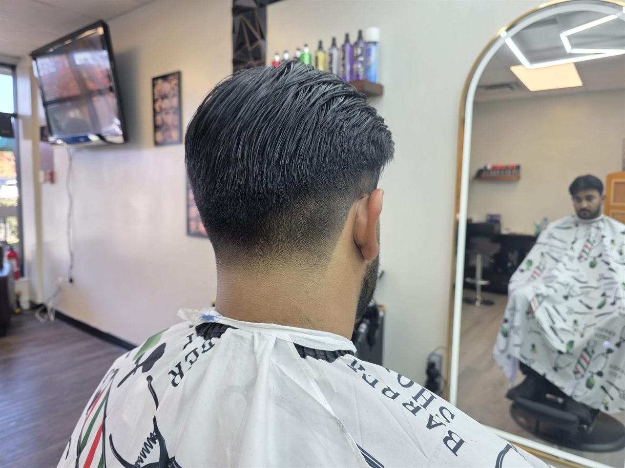 Low skin fade and beard lineup at Royal Look Barber Shop near Royal Oak